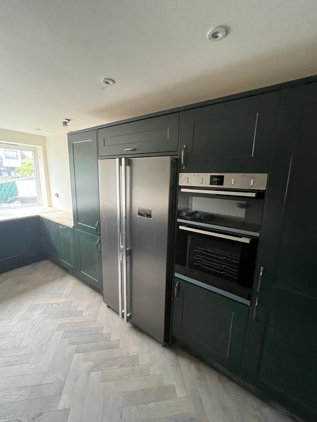 Integrated ovens and fridge column